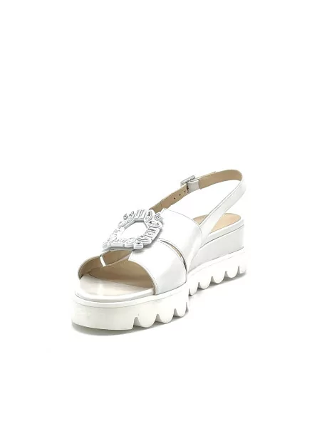 Milk color leather sandal with jewel accessory. Leather lining, leather covered 